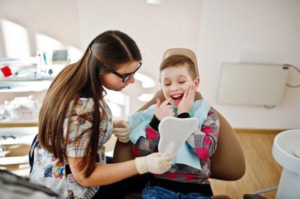 Little boy at dentist chair. Children dental.