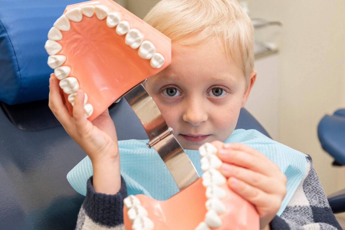 little boy at dentist s office doctor dentist